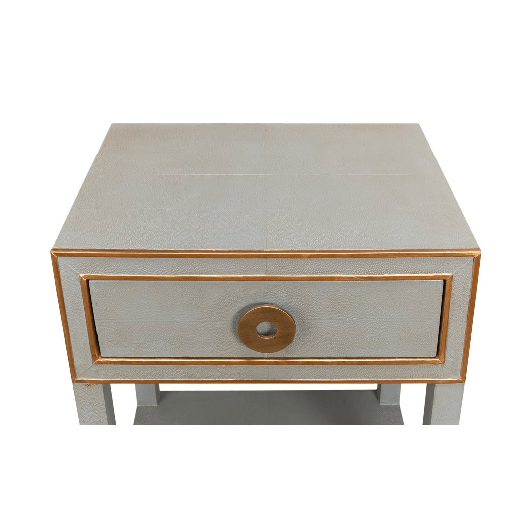 Top-down view of grey nightstand surface.