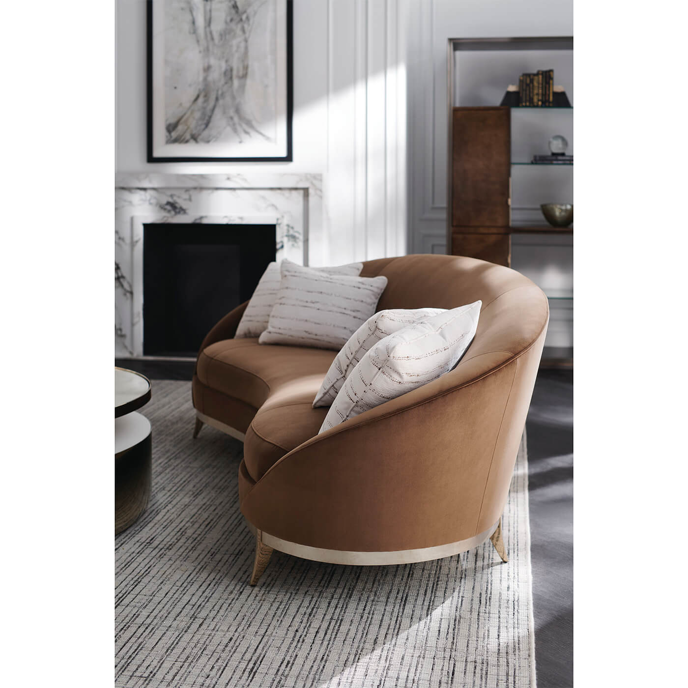 Kidney sofa in elegant living room setting.