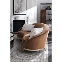 Kidney sofa in elegant living room setting.