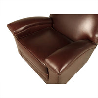 Top close-up of seat on leather club chair.