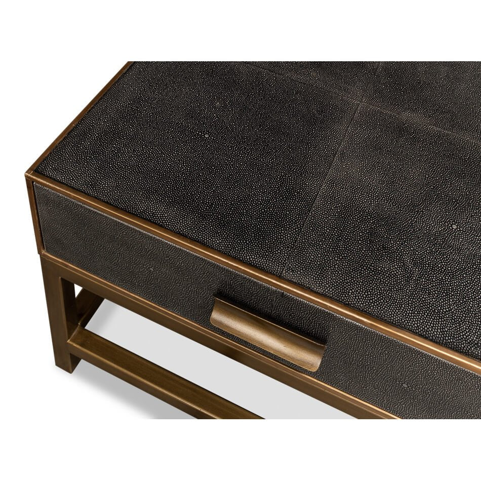 Top corner view of antique grey leather table.