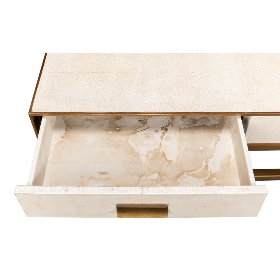 Open drawer of white leather coffee table with storage.