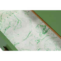 Close-up of marble-patterned drawer interior