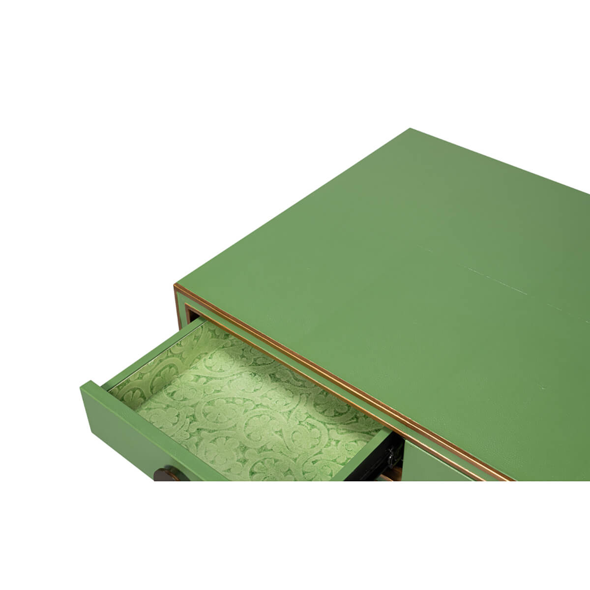 Open drawer with patterned interior in green desk