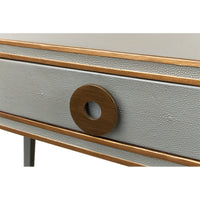 Detailed view of drawer pull, bronze circle design.