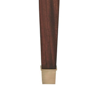 Leg detail with metal tip of coffee table.