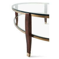 Side view of oval glass coffee table leg detail.