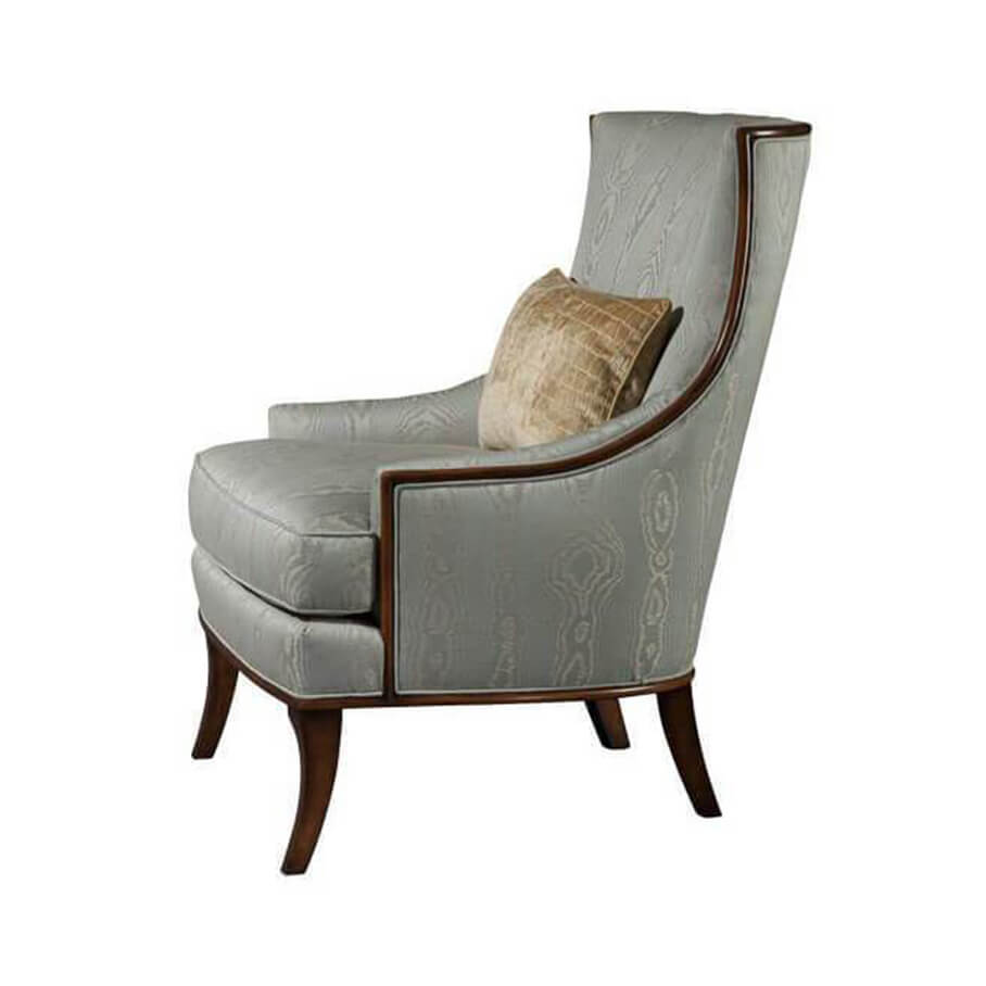 Light blue scoop back armchair, side angle view.
