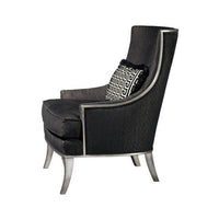 Black scoop back armchair, side angle view.