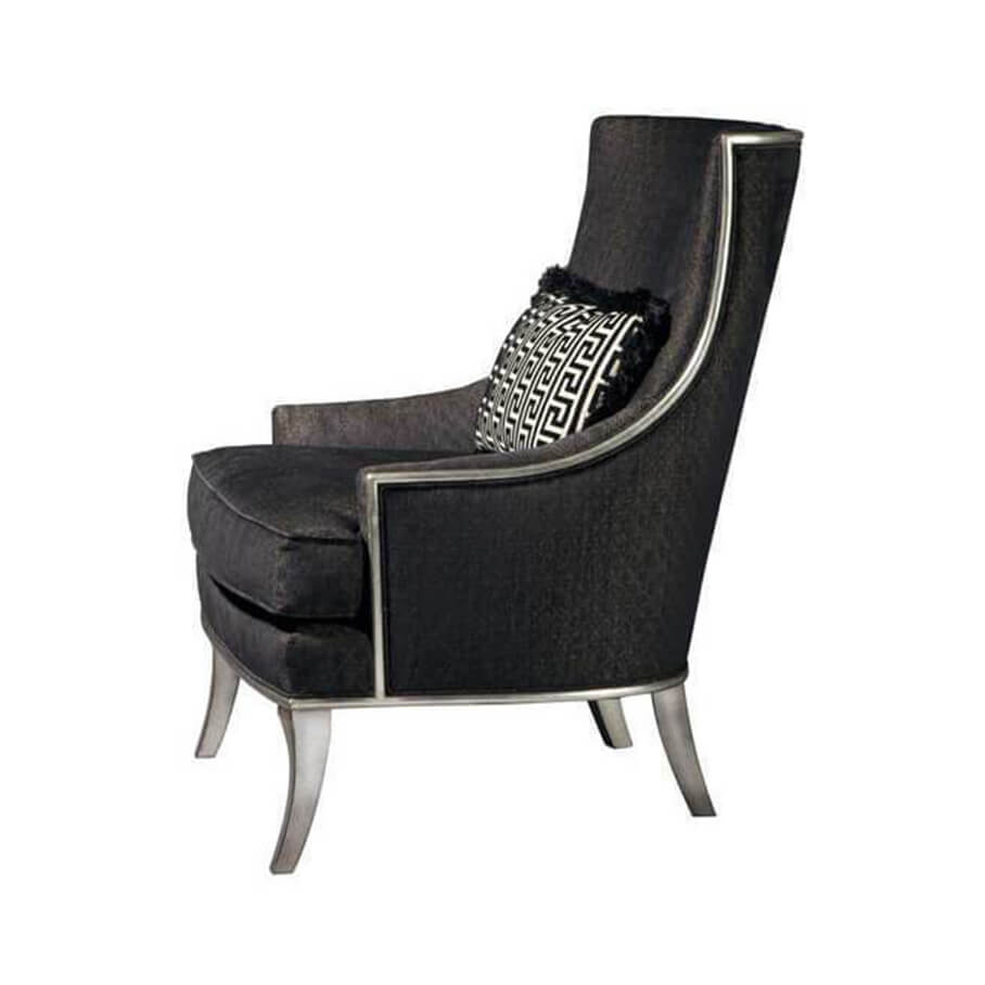 Black scoop back armchair, side angle view.