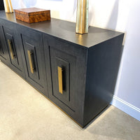 Side view of Art Deco Sideboard, elegant brass accents.