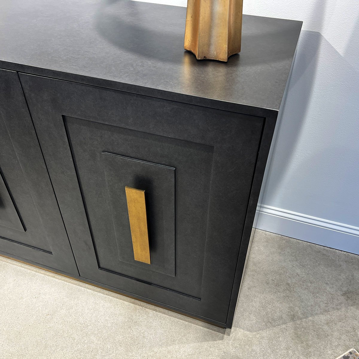 Close-up of Art Deco Sideboard, detailed brass handle.