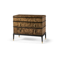 Three-drawer burl wood dresser, front view.