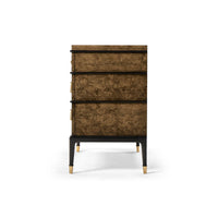 Side view of the burl wood chest of drawers.