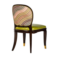 Art Deco dining chair back view with patterned fabric.