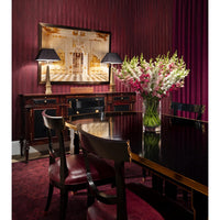 Art deco dining table in elegant room setting.