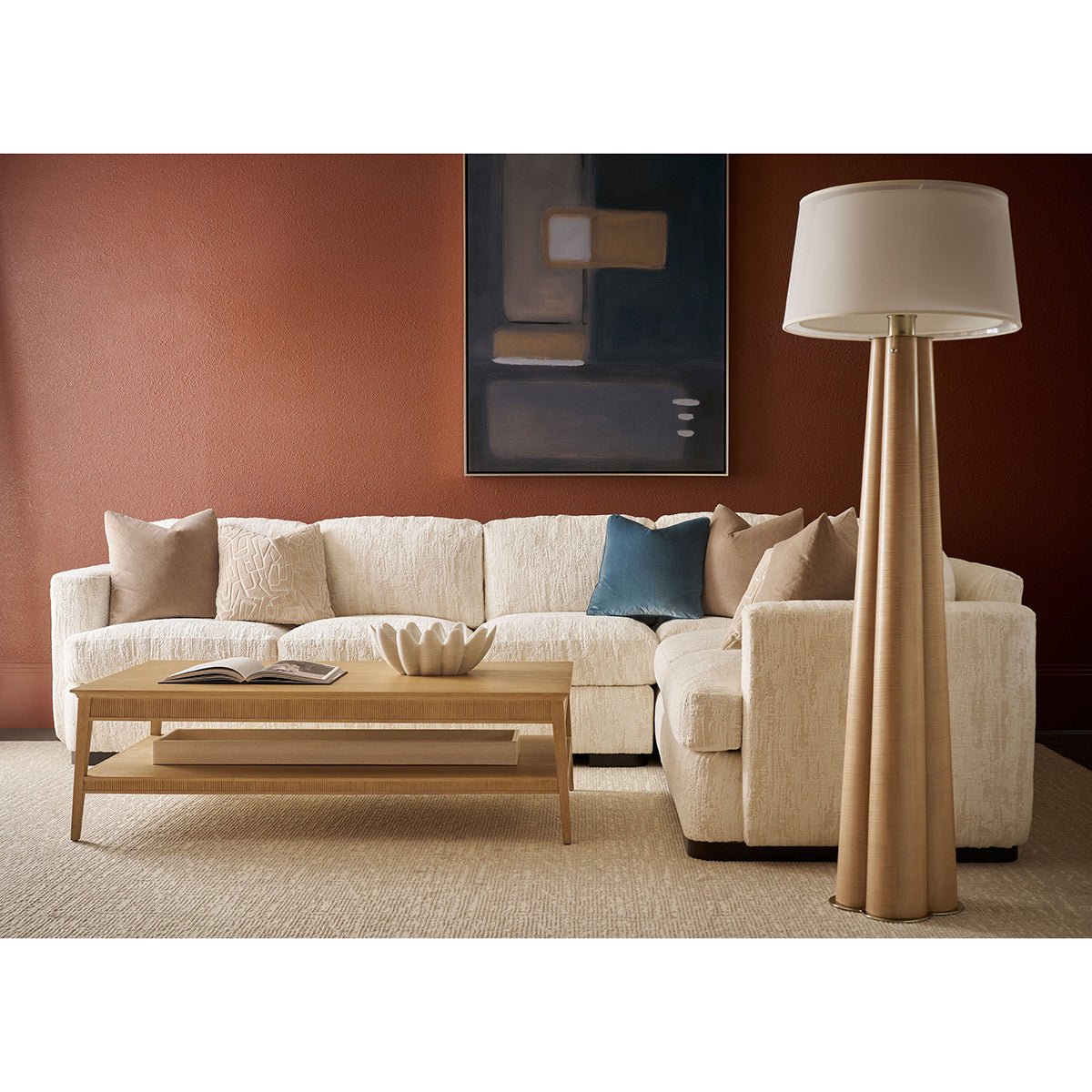 Floor lamp in modern living room, next to sofa.