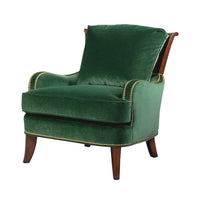 Green velvet accent chair, front angle view.