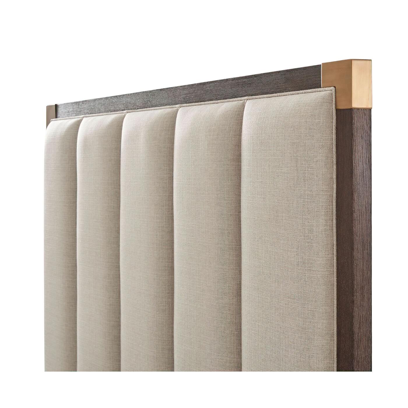 Beige queen bed headboard, texture and top detail.
