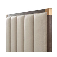 Beige queen bed headboard, texture and top detail.