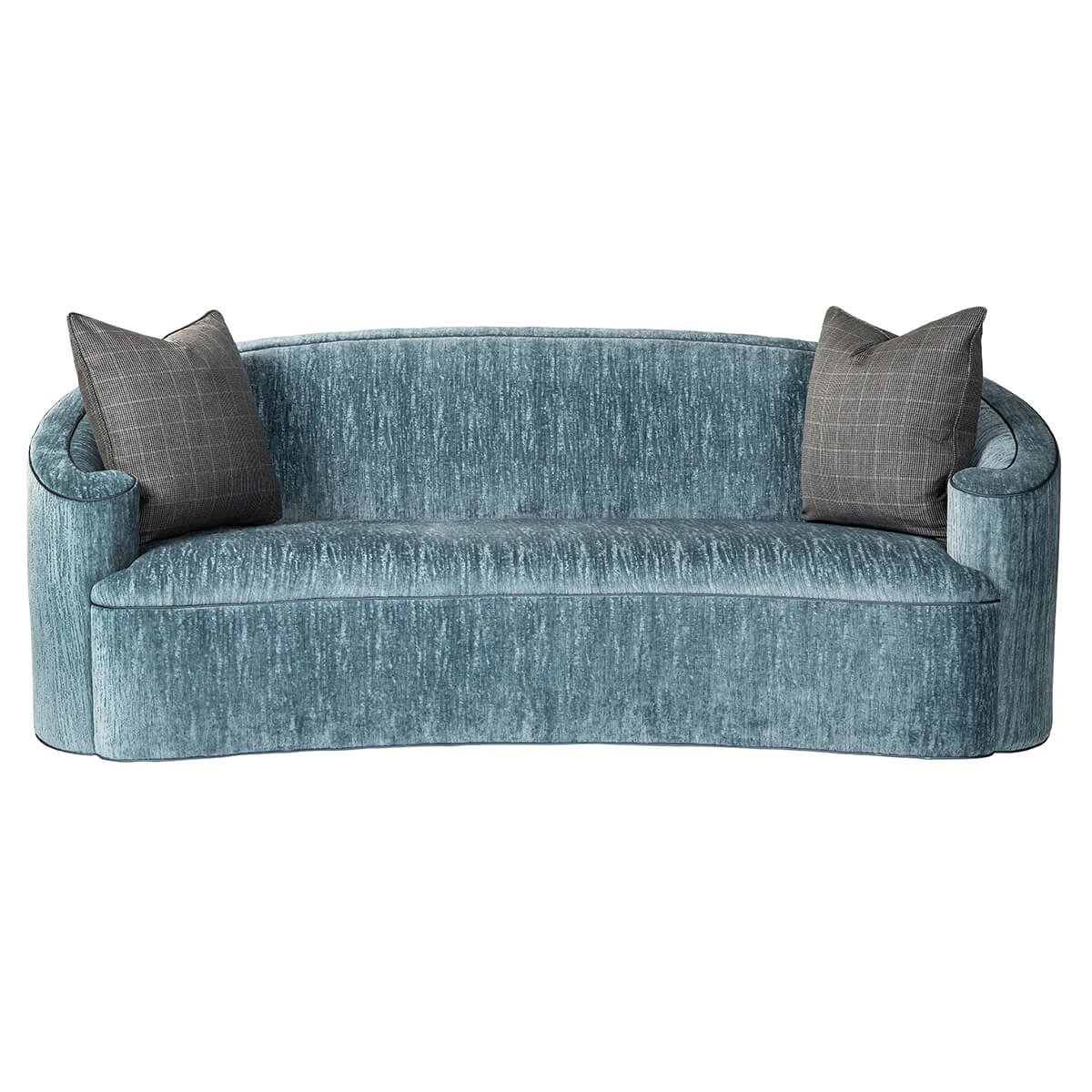 Front view of art deco style scroll sofa with pillows.