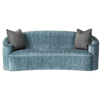 Front view of art deco style scroll sofa with pillows.