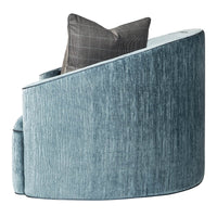 Side view of art deco style scroll sofa with pillow.