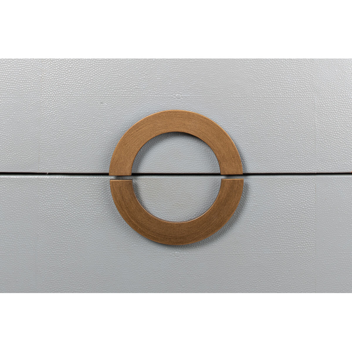 Close-up of drawer handle on Art Deco dresser.