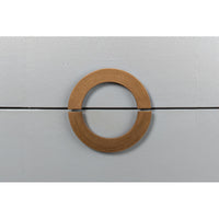 Close-up of drawer handle on Art Deco dresser.