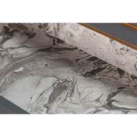 Marbled design inside grey dresser drawer.