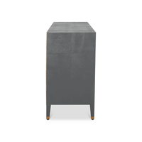 Side profile grey dresser, visible brass detail.