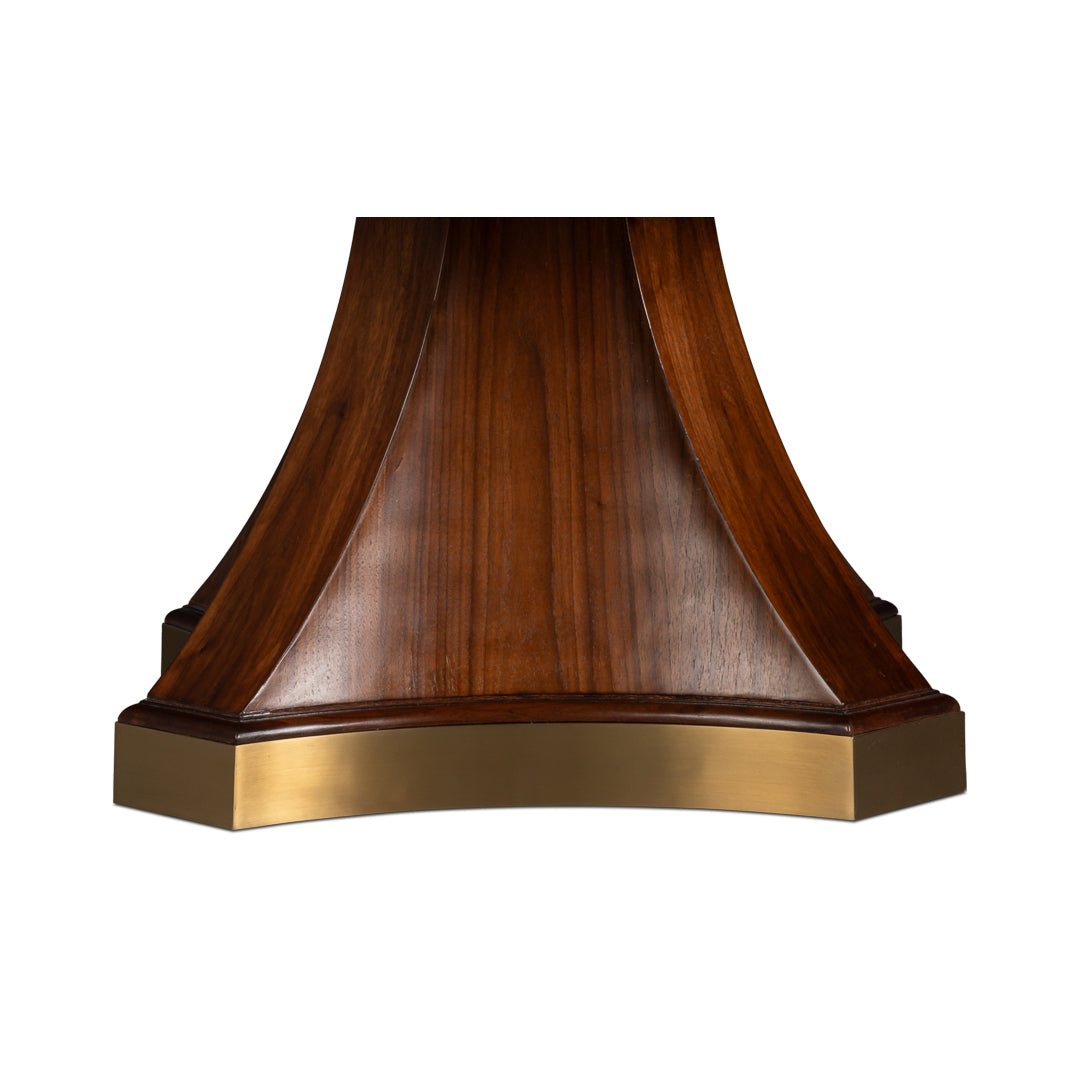 Walnut dining table pedestal base close-up.