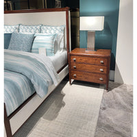 Side view of Art Deco bed, nightstand close-up