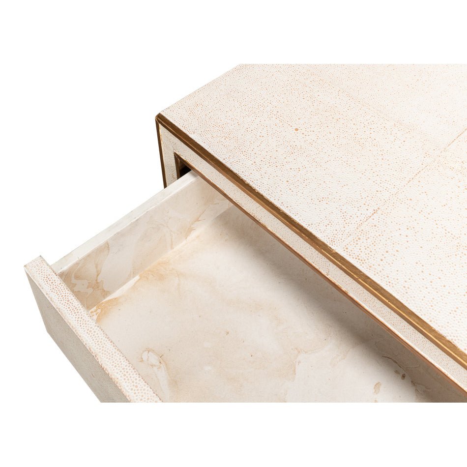Drawer interior of Art Deco white nightstand.
