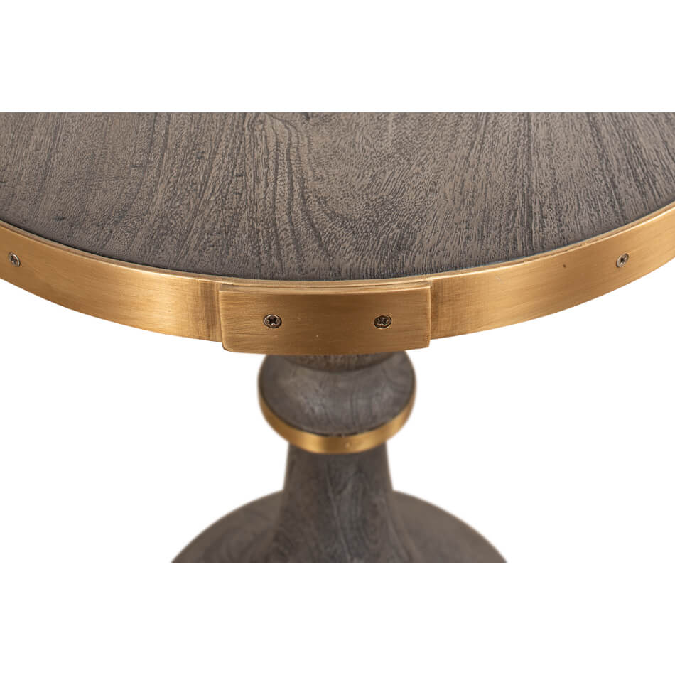 Detail of brass and wood on the Artisan accent table.