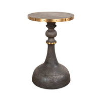 Artisan accent table with wooden base and brass trim.