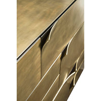 Angled top view of brass dresser, closed drawers.