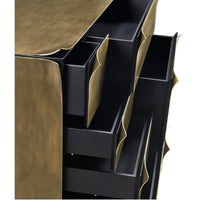 Top view of brass dresser, multiple open drawers.