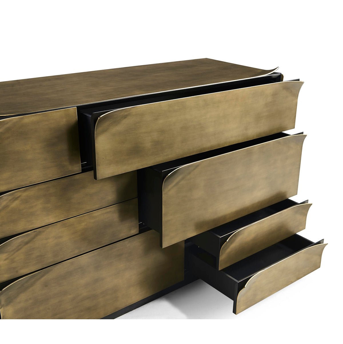 Close-up of brass dresser, open side drawers.
