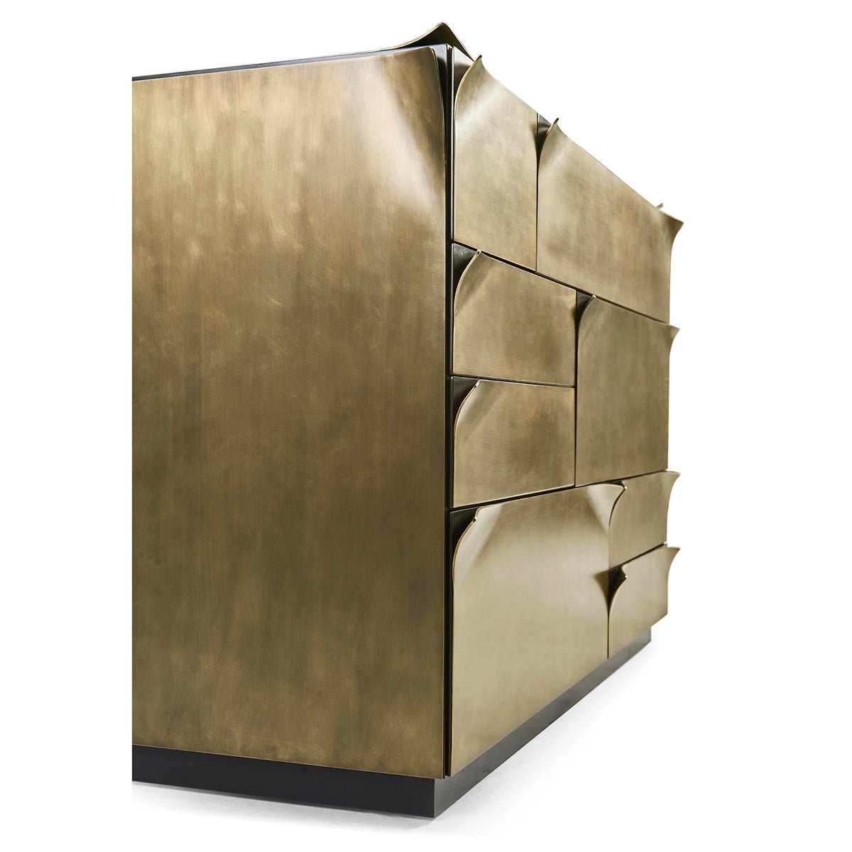 Angled side view of brass dresser, artistic design.