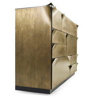 Angled side view of brass dresser, artistic design.