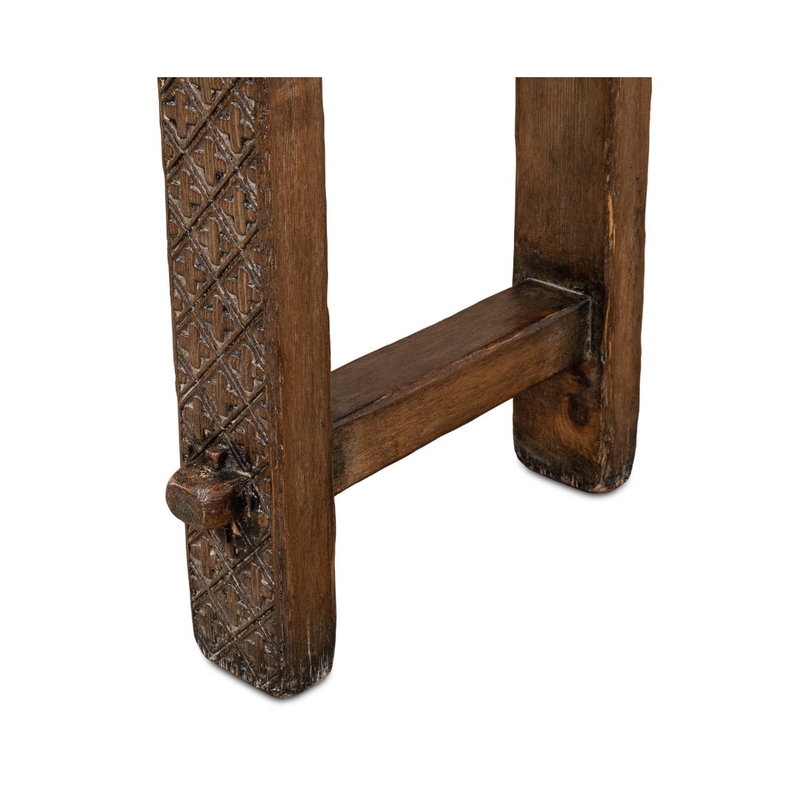 Detailed view of console table leg carvings.