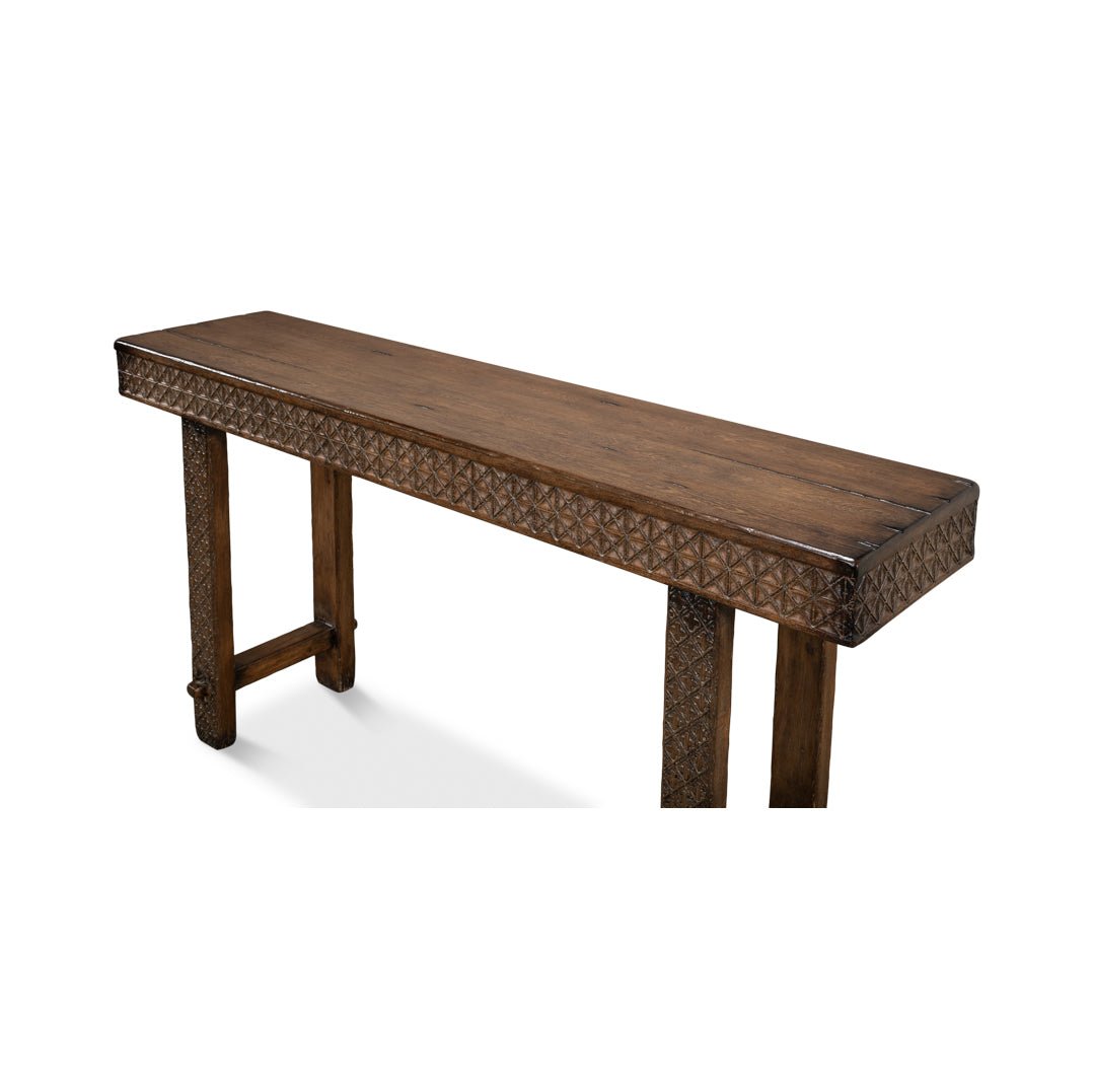 Top view of console table, highlighting carved edges.