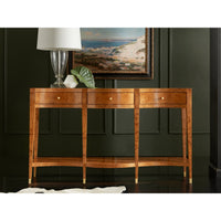 Ash burl console table styled in room, lamp on top.