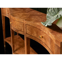Close-up of textured ash burl console table surface.