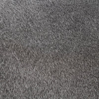 Gray hair-on-hide upholstery close-up showing the counter stool’s fine hair texture and natural speckling.