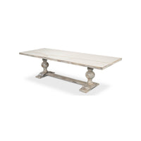 Angled rear view of baroque style dining table.
