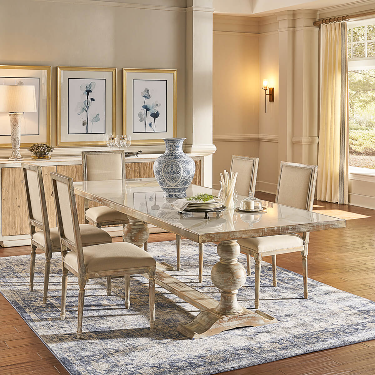 Baroque style dining table in elegant dining room.