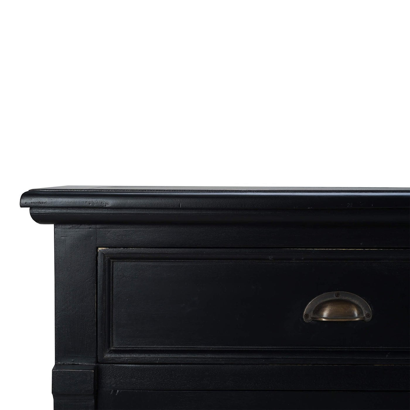 Close-up of sideboard drawer and handle detail.