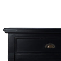 Close-up of sideboard drawer and handle detail.